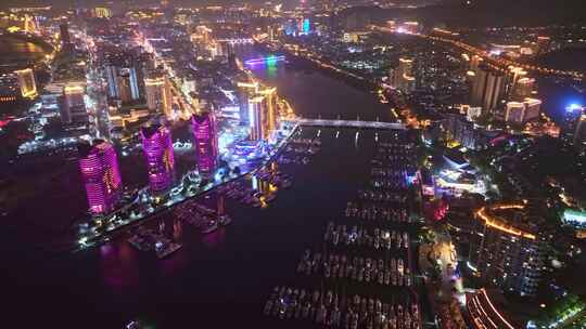 高视角航拍海南三亚游艇旅游与港城市夜景