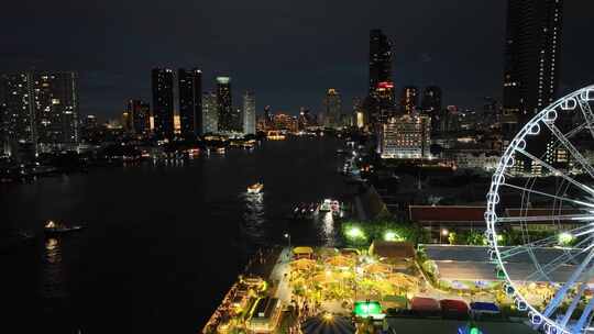 航拍泰国曼谷亚洲河滨夜市湄南河夜景风光