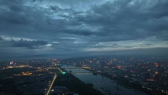 城市航拍洛阳阴雨天后城市云海夜景建筑