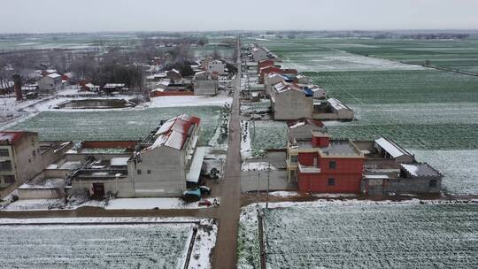 雪后的村庄航拍前进视频素材模板下载