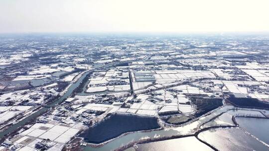 航拍乡镇雪景学校建筑田地大桥别墅河流房屋