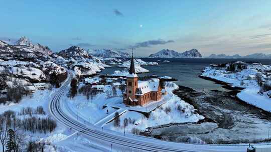 挪威罗弗敦群岛北极圈教堂冬季雪景高空航拍