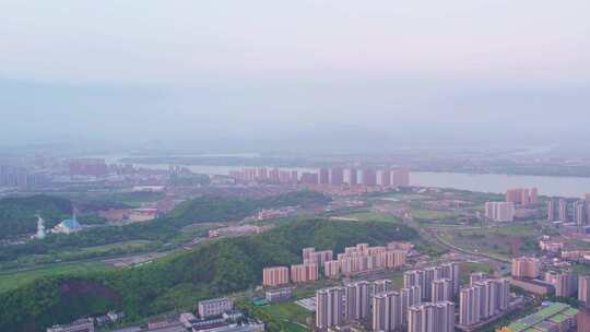 日出晨曦中的杭州滨江城市建筑风景航拍