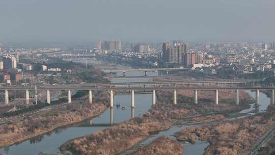 航拍四川广汉城市湔江湿地桥梁西成高铁空镜
