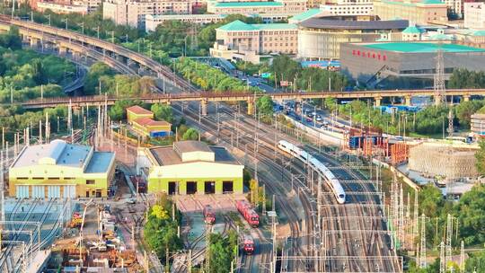 航拍中国高铁行驶在城市中