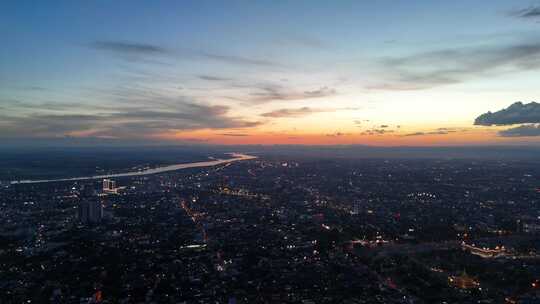 4K航拍夕阳下老挝首都万象城市风光