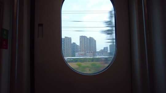 高铁动车火车车厢窗外的景色风景视频素材