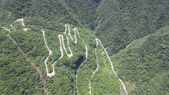 航拍湖北神农架蜿蜒公路十回首