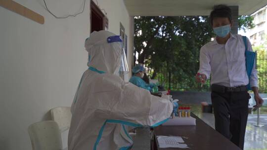 核酸检测人员 志愿者 人们做核酸 抗击疫情