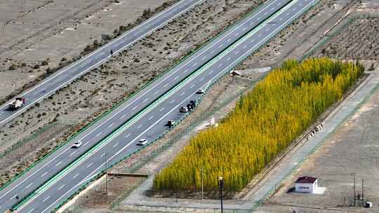 航拍青海荒漠中的高速公路和大地裂纹