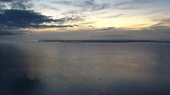 海边日出天空海滩马来西亚海边海岛蓝色大海