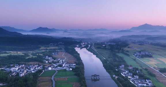 航拍山村秋天日出薄雾美景