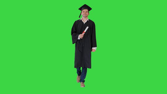 拿着毕业证书边走边微笑的男学生视频素材模板下载