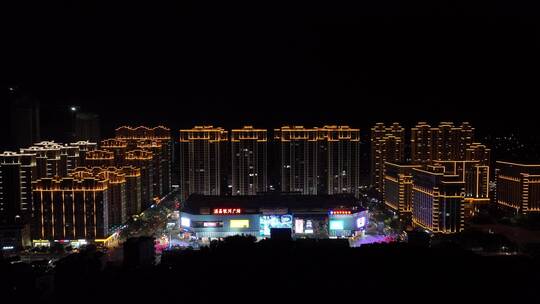 城镇小区广场夜景航拍城市夜景楼房住宅小区