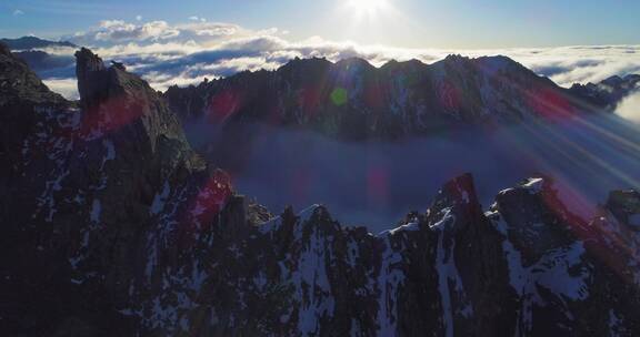 航拍巴郎山雪山雄伟日出云海陡峭山峰