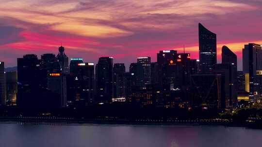 CBD城市高楼大厦杭州钱塘江晚霞夜景