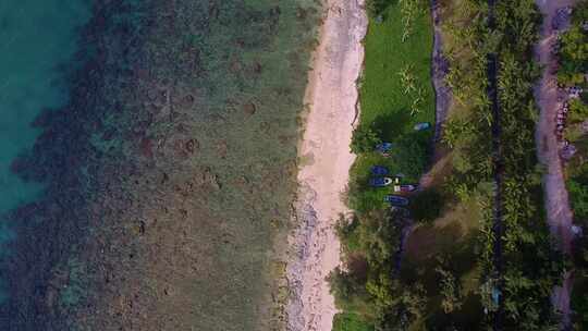 航拍海南三亚西岛海洋文化旅游区海浪礁石