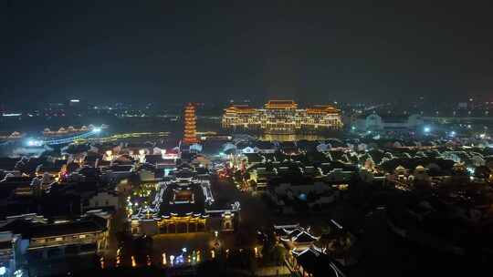 古塔上空绚烂烟花绽放的夜景 芜湖鸠兹古镇