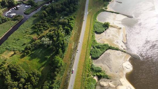 航拍海岸边公路旁的农田视频素材模板下载