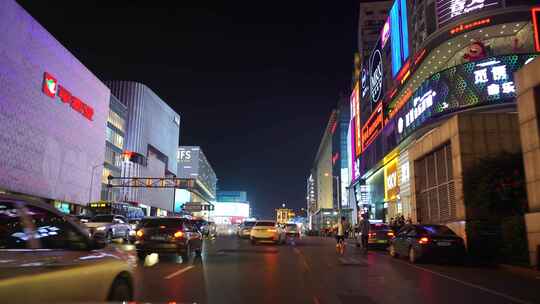汽车窗外城市夜生活繁荣街道夜晚商业街中心视频素材模板下载