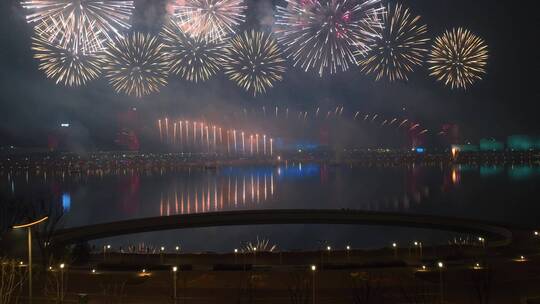 航拍西安浐灞奥体中心新年灯火烟花秀视频素材模板下载