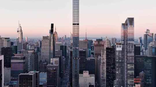 城市航拍纽约曼哈顿施坦威大厦摩天大楼日出视频素材模板下载