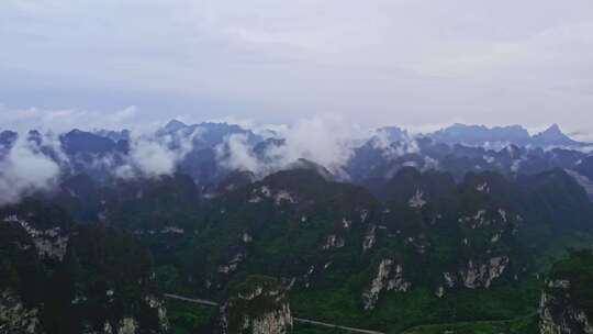 航拍雨后群山云雾缭绕山峦叠嶂山脉山川