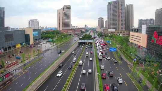 航拍城市快速路拥堵车流楼宇群建筑高楼视频素材模板下载