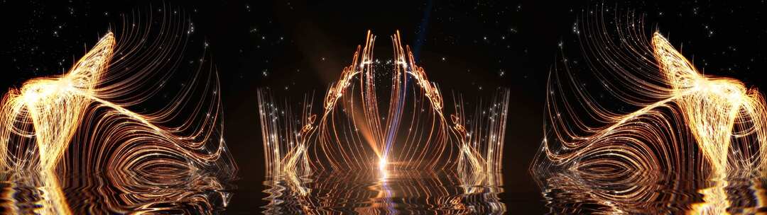 金色光束粒子照射水面抽象背景