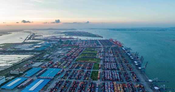 4k广州南沙港货运集装箱码头日落航拍延时
