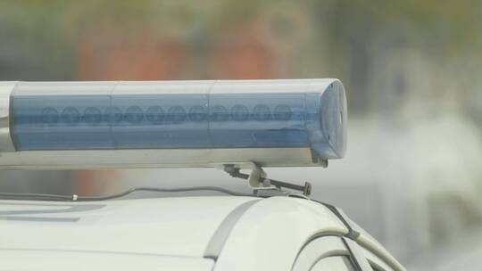 警车车顶上闪烁的闪光灯视频素材模板下载
