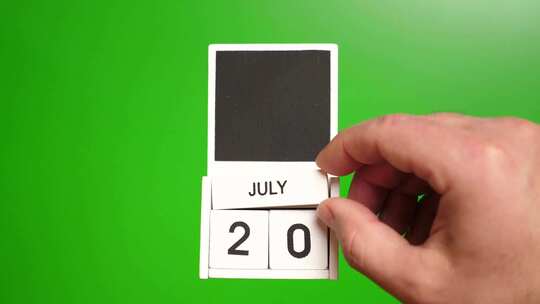 07.绿色背景上日期为7月20日的日历。视频素材模板下载