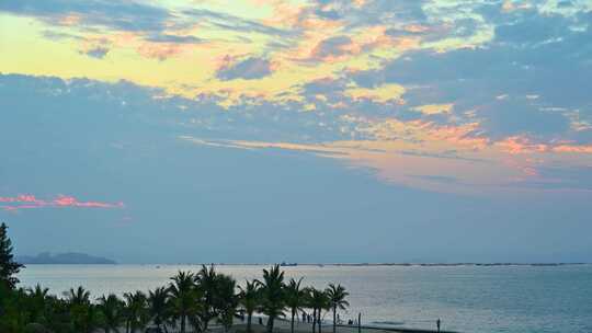 中国海南三亚海边沙滩日落夕阳晚霞视频素材模板下载