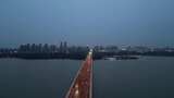 航拍安徽蚌埠龙湖大桥夜景高清在线视频素材下载