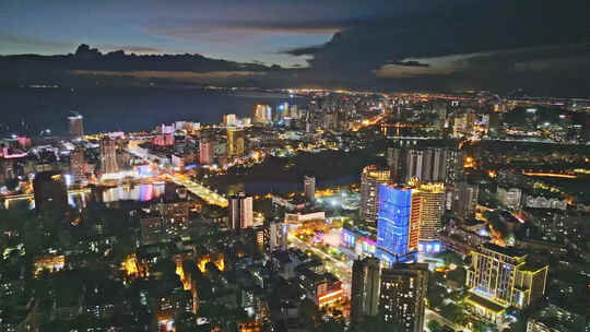 海南三亚湾凤凰岛沿海城市夜景全景