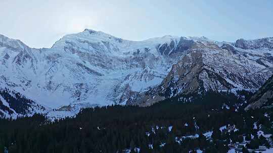 航拍新疆克州冰川公园阿依拉尼什雪山与森林