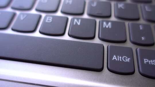 电脑键盘作为背景旋转视频素材模板下载