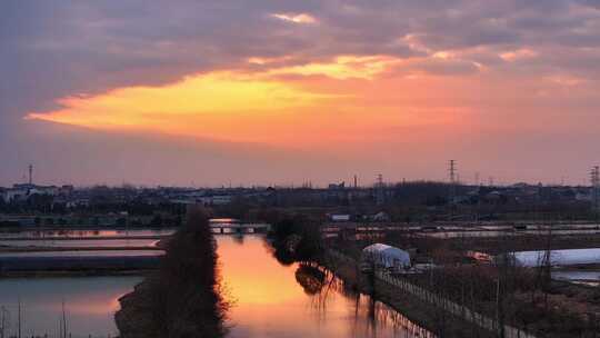 航拍乡村振兴龙型丁达尔光效河流鸟群夕阳