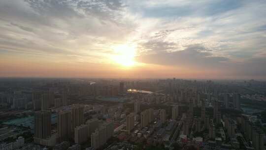 城市夕阳晚霞火烧云夜景降临航拍