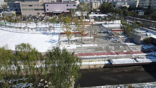 航拍济南冬季雪景大道交通