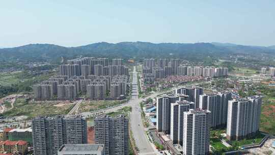 山间的现代化城市住宅建筑群鸟瞰全景