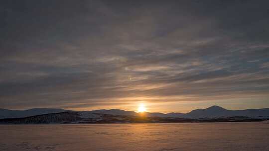 高原雪域雪原雪山日落延时风景夕阳火烧云