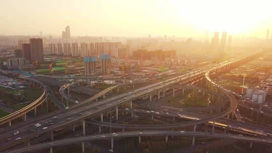 航拍夕阳下杭州萧山机场城市大道高架车流视频素材模板下载