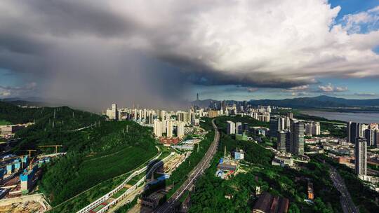 4k延时深圳市区雨后彩虹蓝天白云