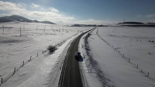 冬季雪天内蒙乌兰布统塞罕坝草原公路4K航拍