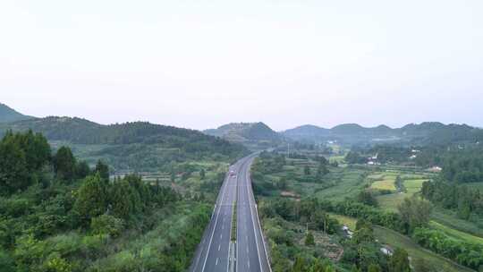 航拍四川南充遂西高速与乡村风景