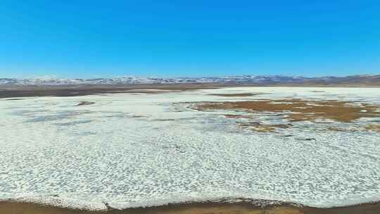 航拍甘南尕海湖冰封湖面风光视频素材模板下载