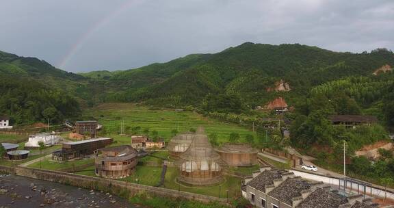 航拍雨后乡村彩虹古建筑环境梯田