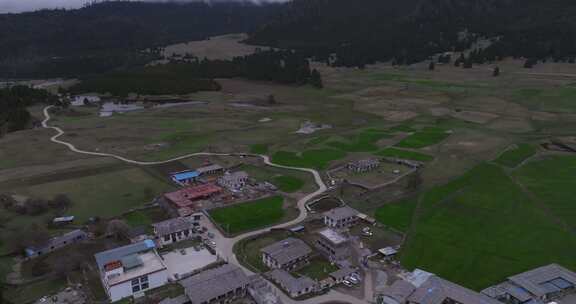 西藏林芝地区鲁朗小镇雪景高空航拍
