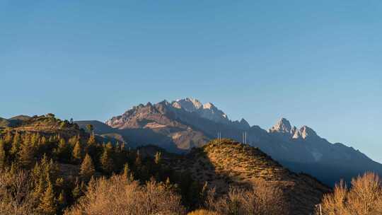 8k云南丽江玉龙雪山日照金山延时摄影